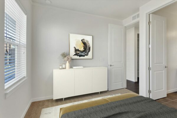 Rendering of a bedroom with large windows, carpet, and white walls.