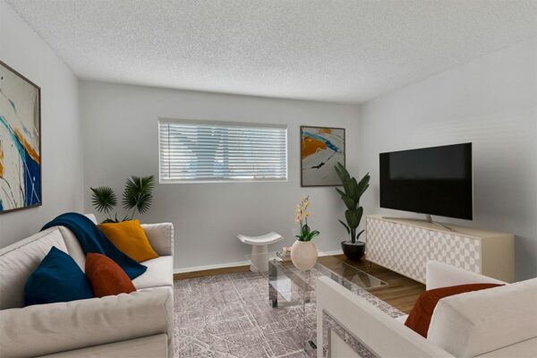 Rendering of a living room with a carpet over wood floors, white walls, and a window.