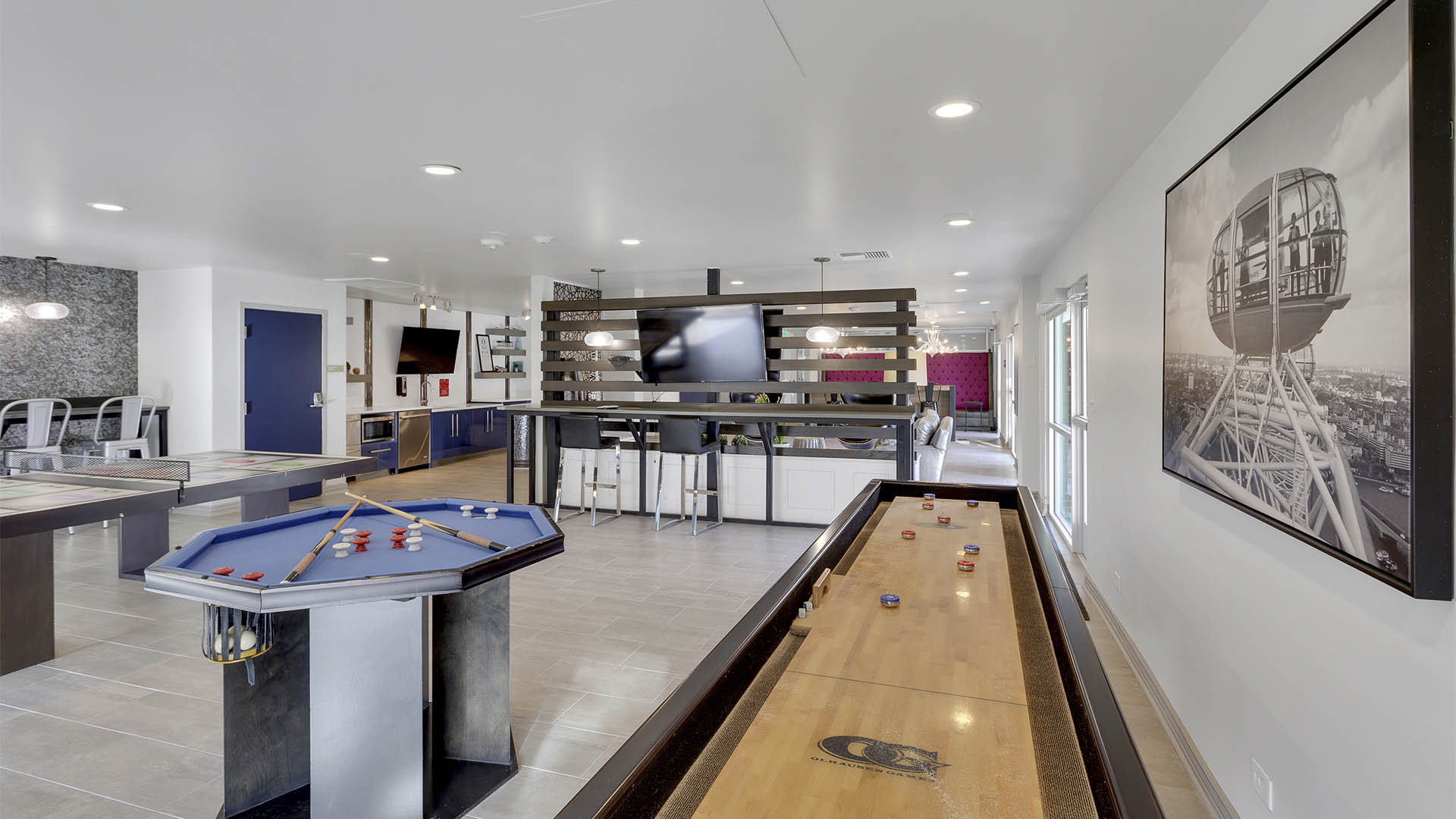 Indoor Amenities area with shuffle board and pool table.