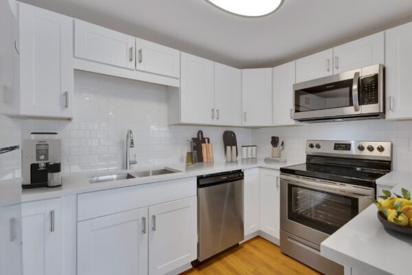 kitchen with white cabinets and stainless steele appliances