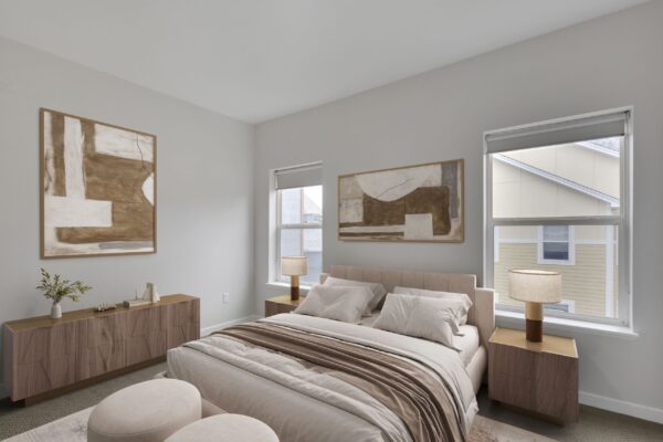 one bedroom with bed in middle, dresser, and two large windows