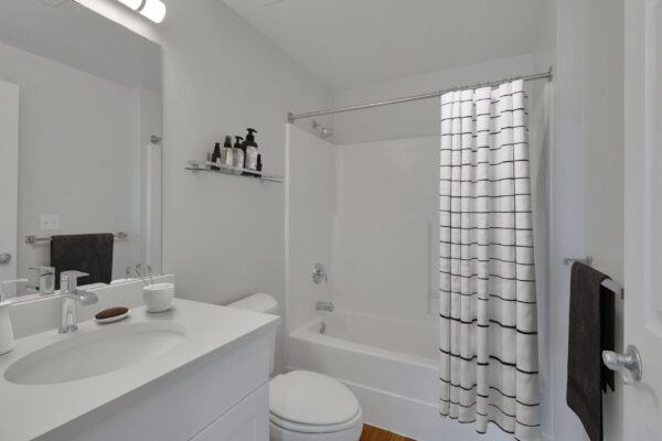 bathroom with tub and sink