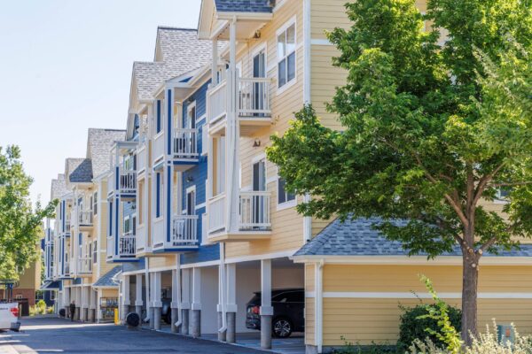 yellow building with parking