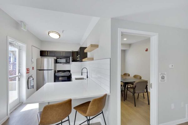 Trocadero apartments community kitchen and conference room.
