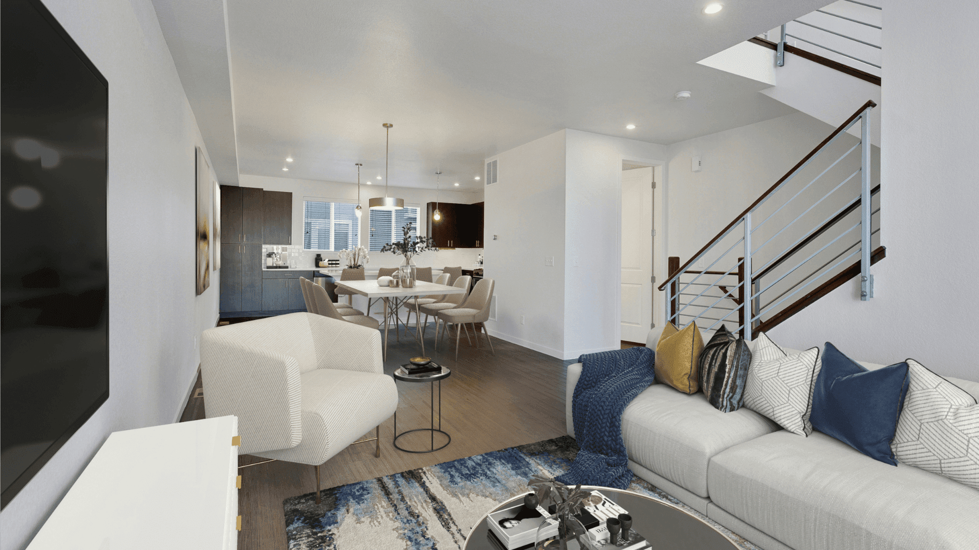 townhome living room with couch and kitchen