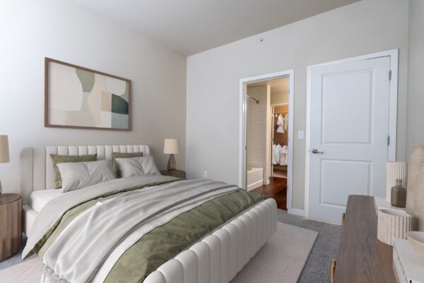 large bedroom with closet and dresser