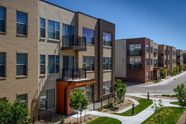 Monaco Row apartments with modern architecture and brick construction.