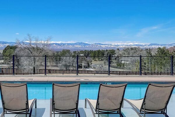 Monaco Row pool area with lounge chairs.