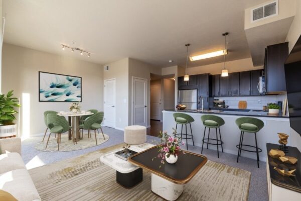 large living room with kitchen and bar stools with dining area