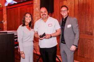 alex aldaco accepting award