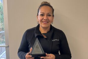 Angelica Barron accepting the Housekeeper of the Year award