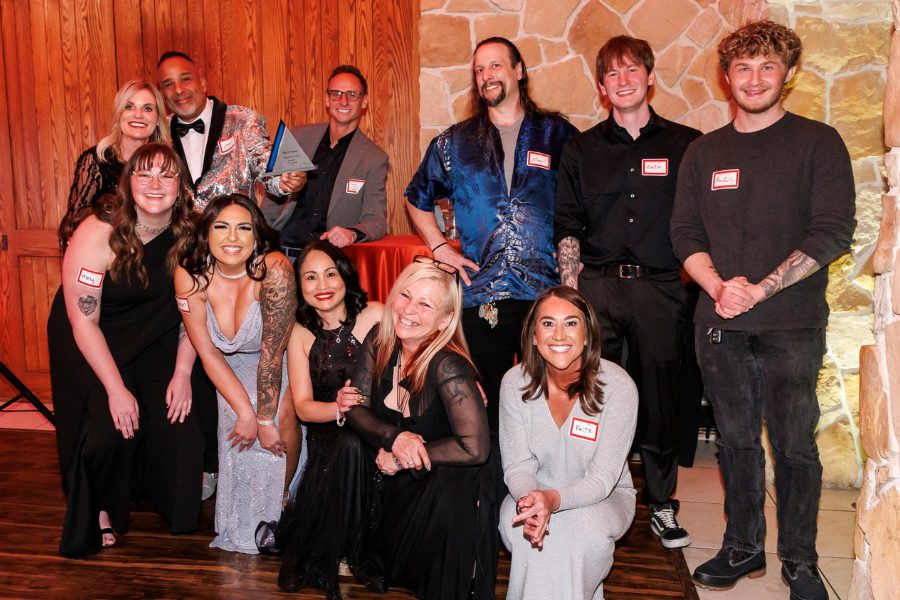 the team of DTC central accepting community of year award