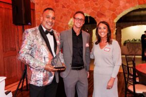 eric williams accepting community team member of the year award