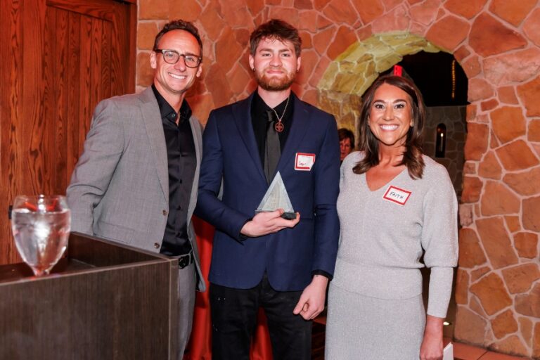 logan lovingier accepting rookie of the year award