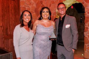 natalie cairo accepting resident champion of the year award