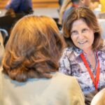 two people speaking to each other