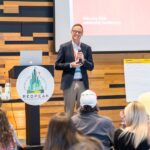 Josh Foley, RedPeak CEO speaking on stage