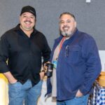 two gentlemen smiling for photo