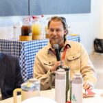 two leaders sitting at table