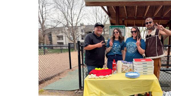 team members around a table with food