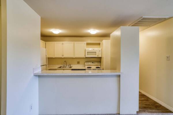 The Manchester apartment kitchen with breakfast bar.